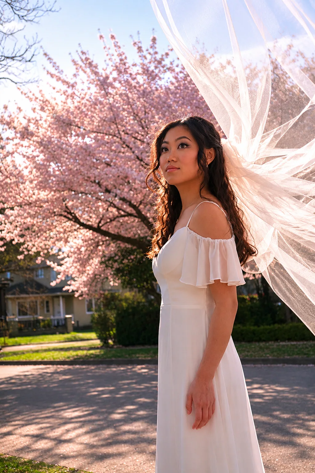 Tiffany in her bridal look among cherry blossoms